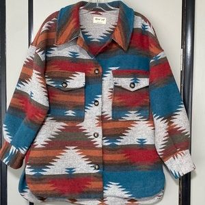 New In. Aztec shacket. Size small but fits oversized. VERY Lightly worn.